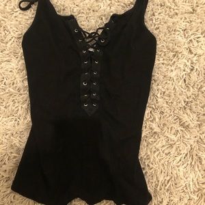 NWOT 
black cross tank top.